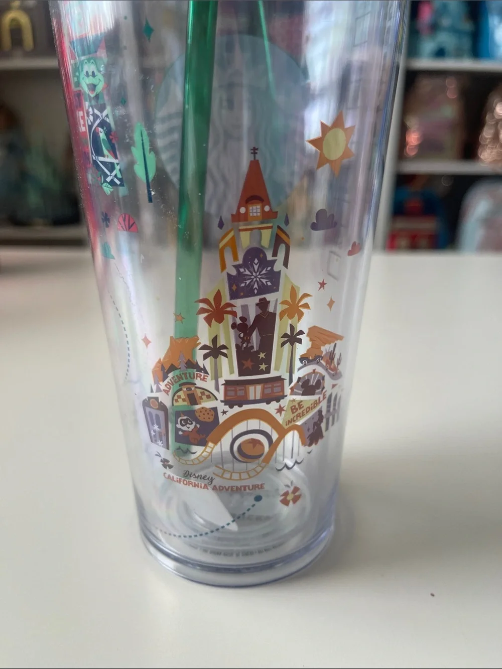 Starbucks Disney parks 24oz Clear Tumbler with Green Straw. Disneyland and DCA